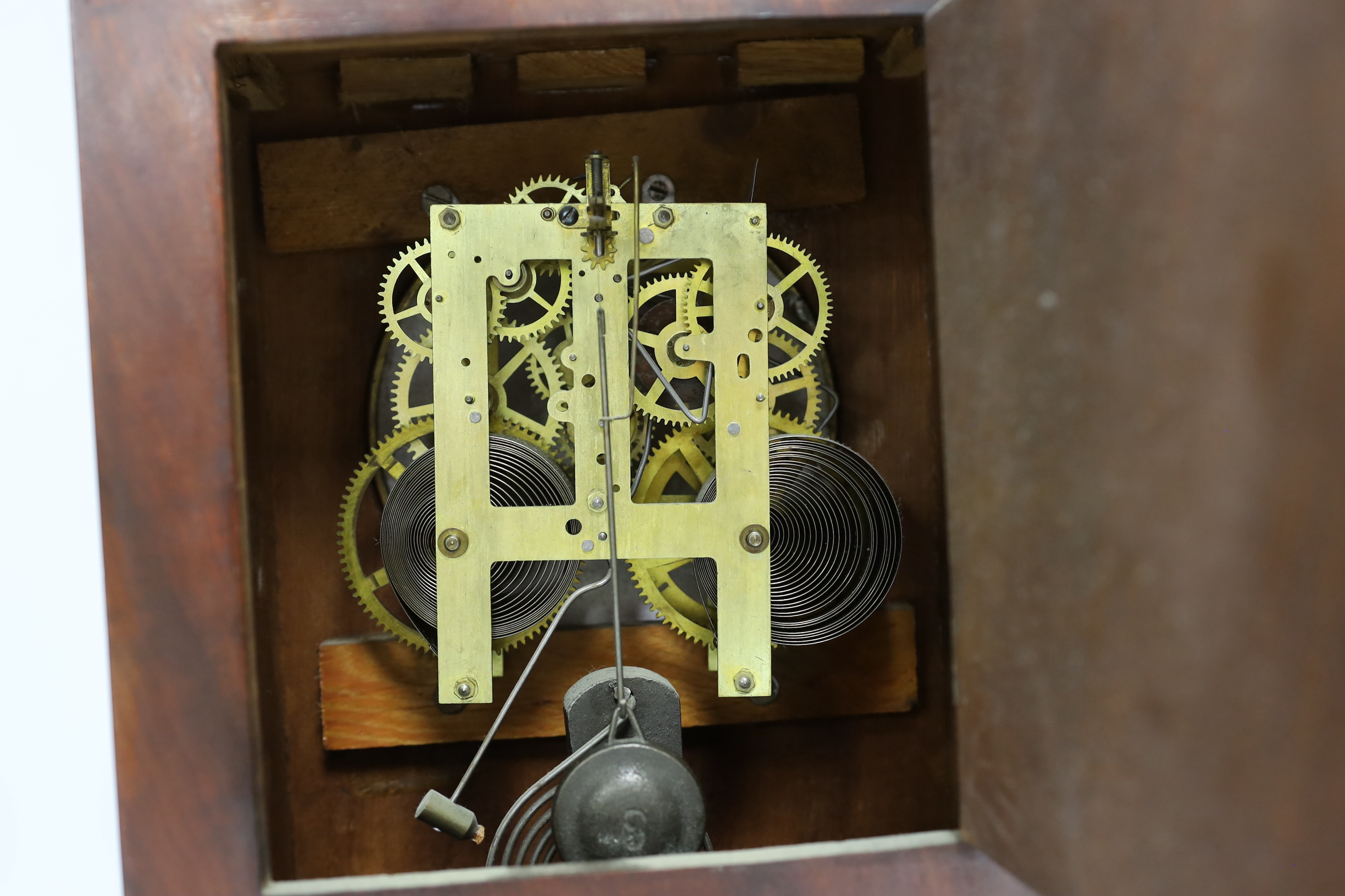 An American brass inlaid mantel clock, striking on a coiled gong, 39.5cm